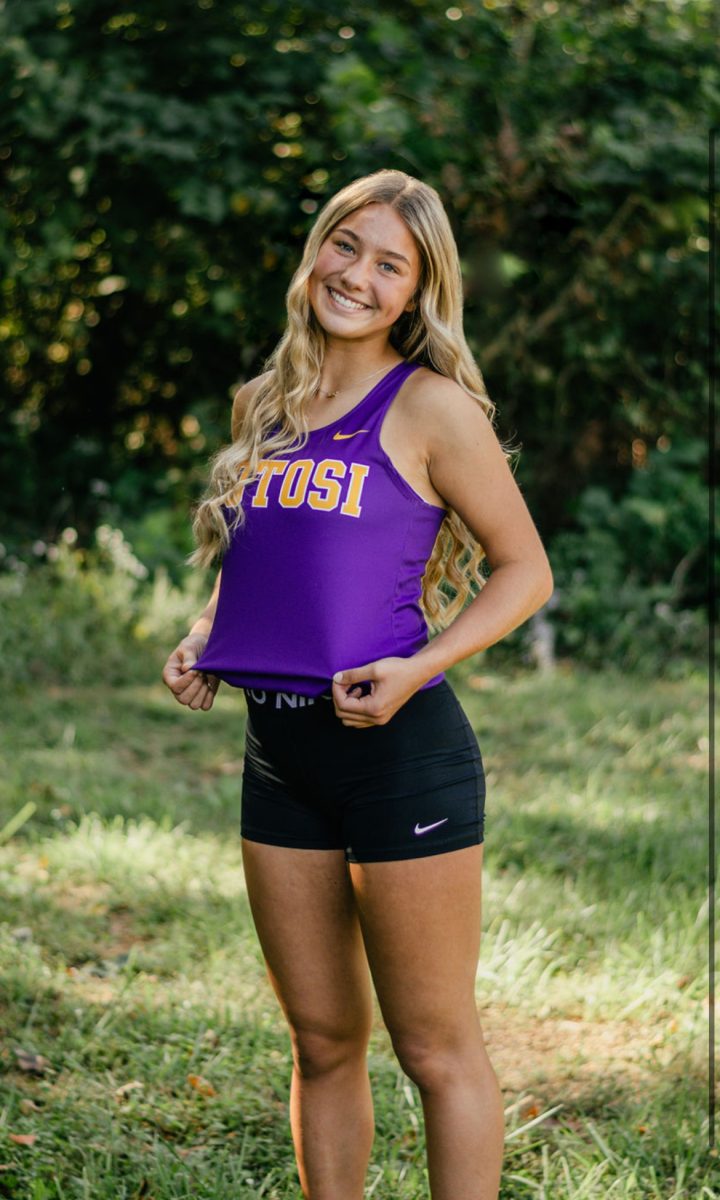 Freshman Presley Smith posing to represent the PHS Cross Country team.  