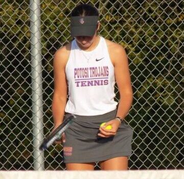 Freshman Chloe Rowe earns a varsity position on the tennis team.