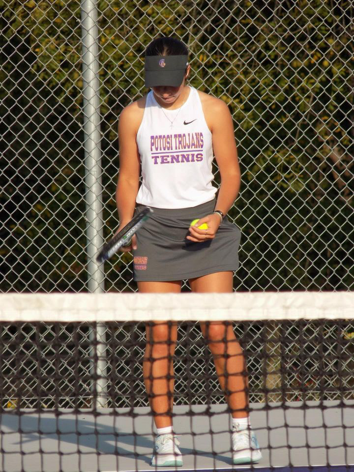 Freshman Chloe Rowe focusing before stepping up for a serve