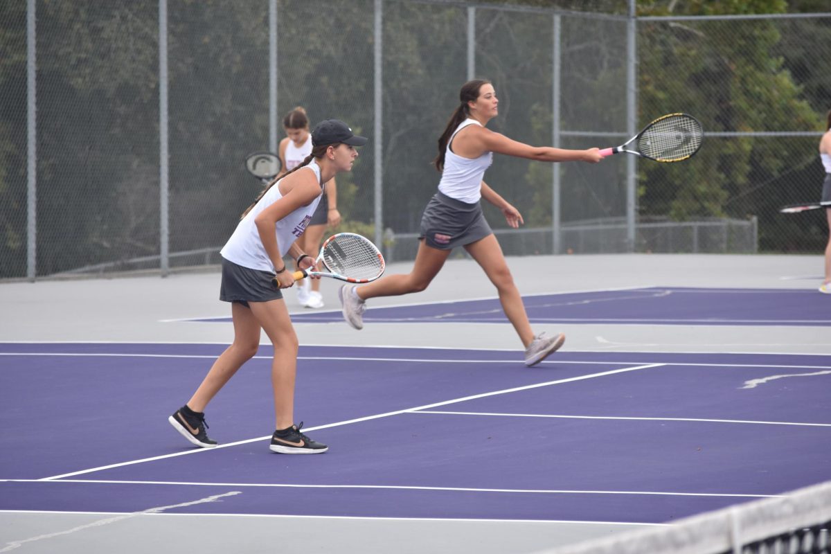 Lady Trojans' Tennis team defeat the Bayless Bronchos on senior night