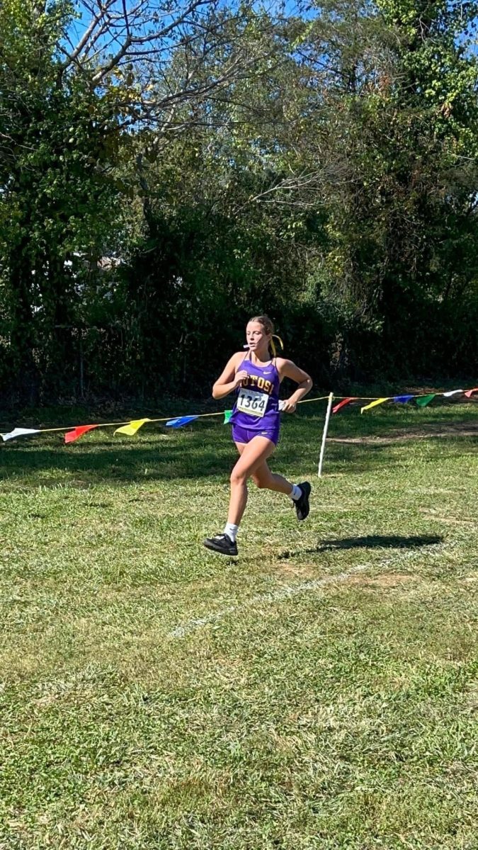 Ava Govro sprinting for the finish line at the 49th annual Potosi Invitational Cross Country meet. 