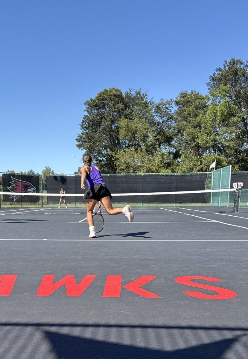 Chloe Rowe hits an ace. 