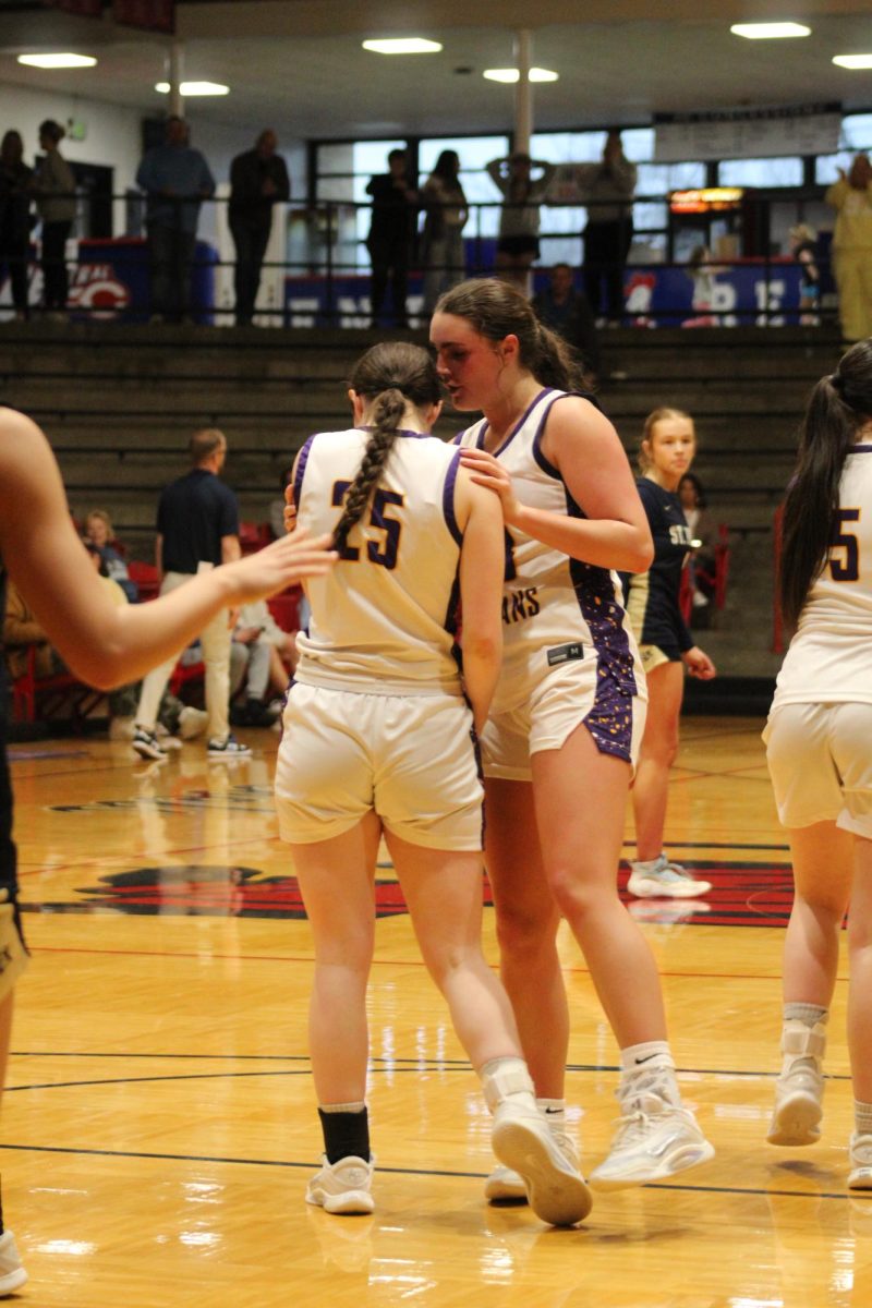 Eden Robart encouraging Sabra Brown before game-changing free-throws